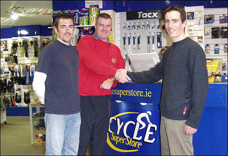 Michael Fearon and John Donnelly of Cycle Super Store with Shane Stokes 