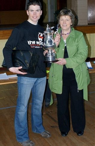 a1_winner_sean_lacey_receiving_the_mick_cahill_memorial_cup_from_mary_cahill.jpg